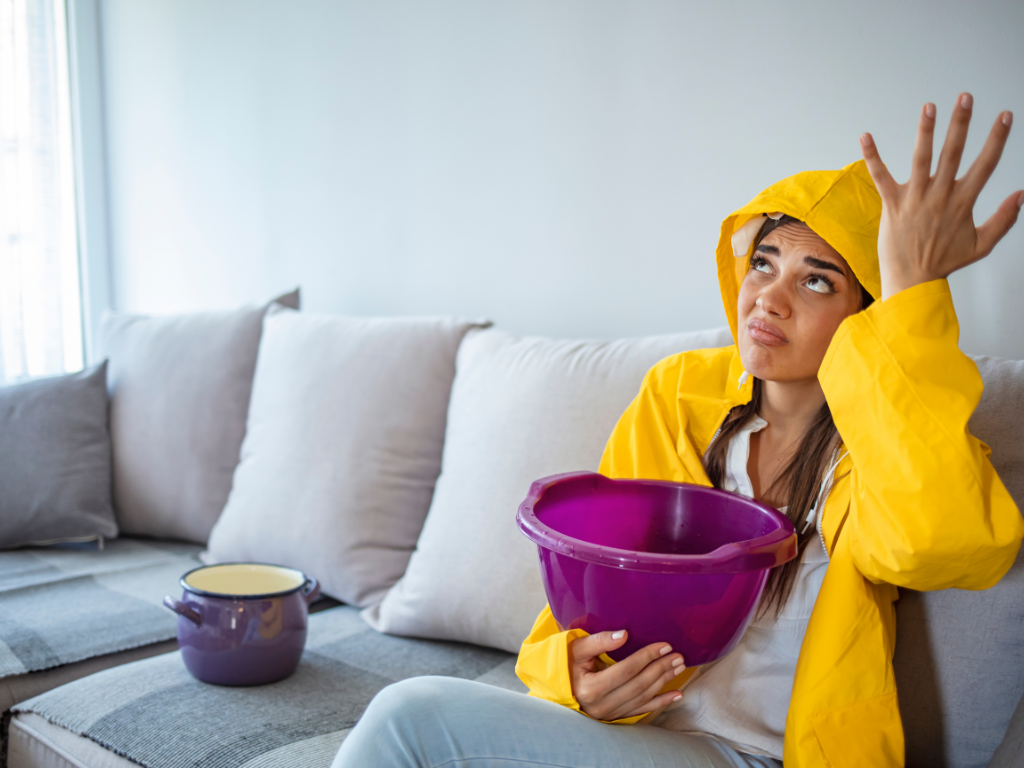 What should you check first when your ceiling stains after rain?